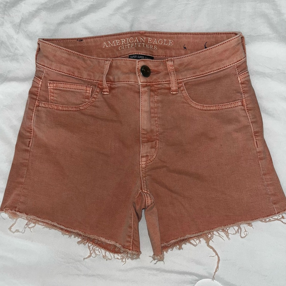 American Eagle peach/salmon high-waisted denim shorts